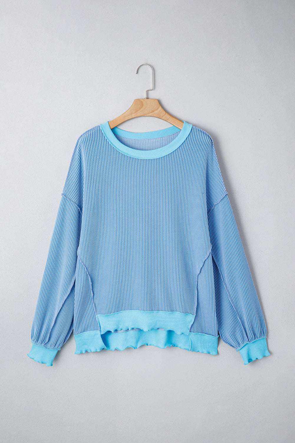 Myosotis Twisted Rib Uneven Hem Drop Shoulder Loose Knit Top