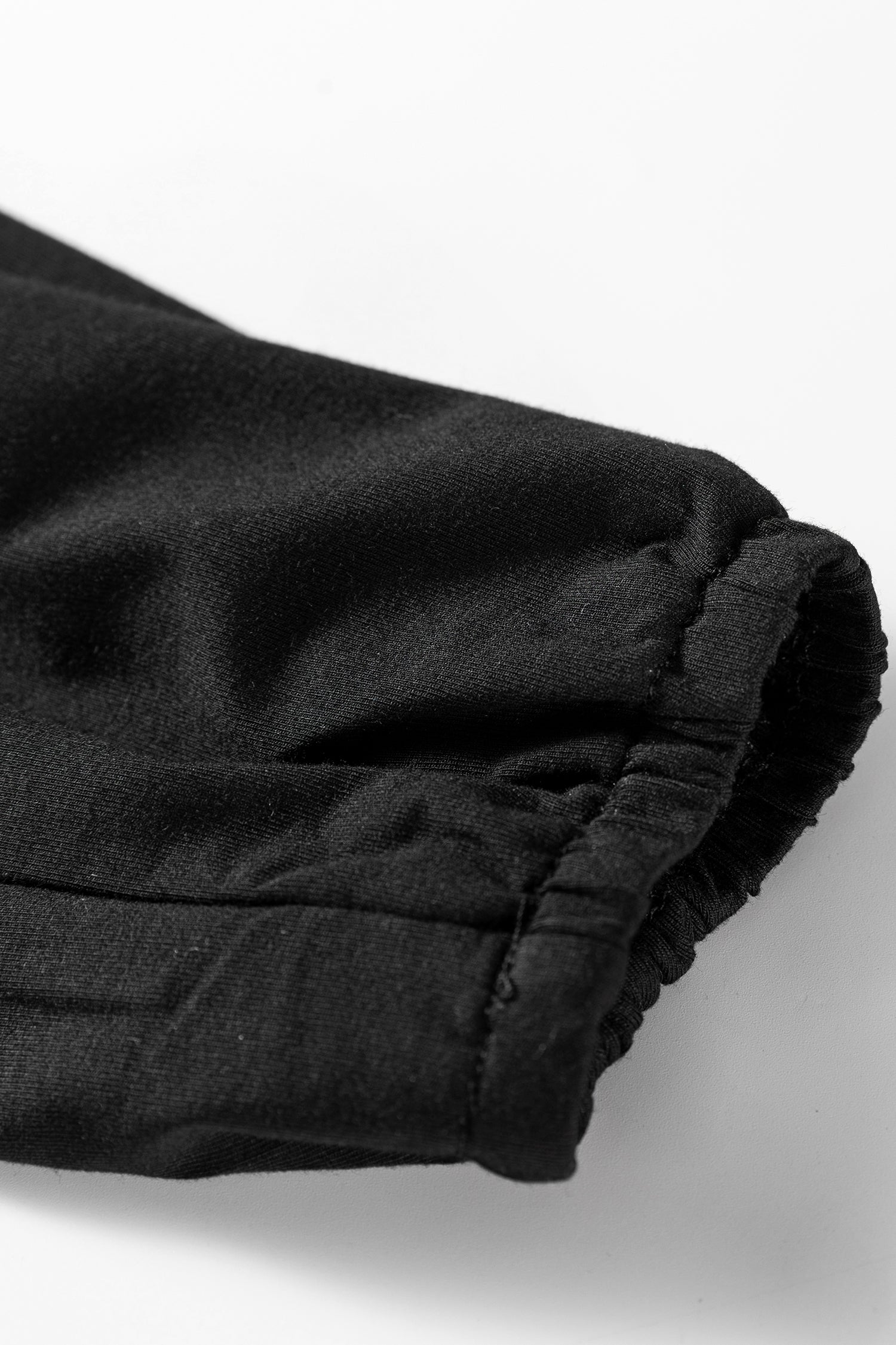 Black Smocked Bust Buttoned Split V Neck Flow Fit Blouse